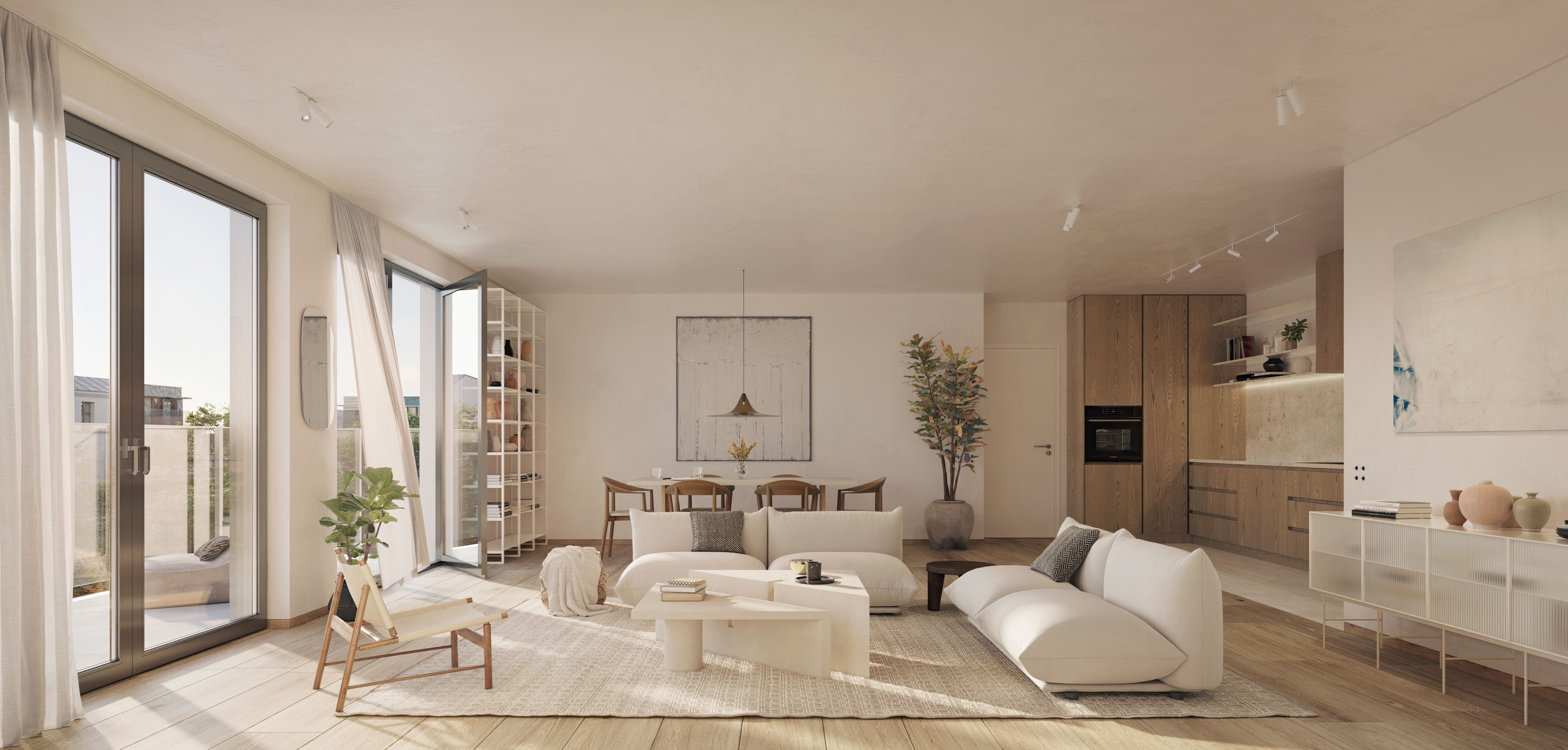 Intérieur d'un appartement spacieux à Evere, les meubles sont modernes et blancs