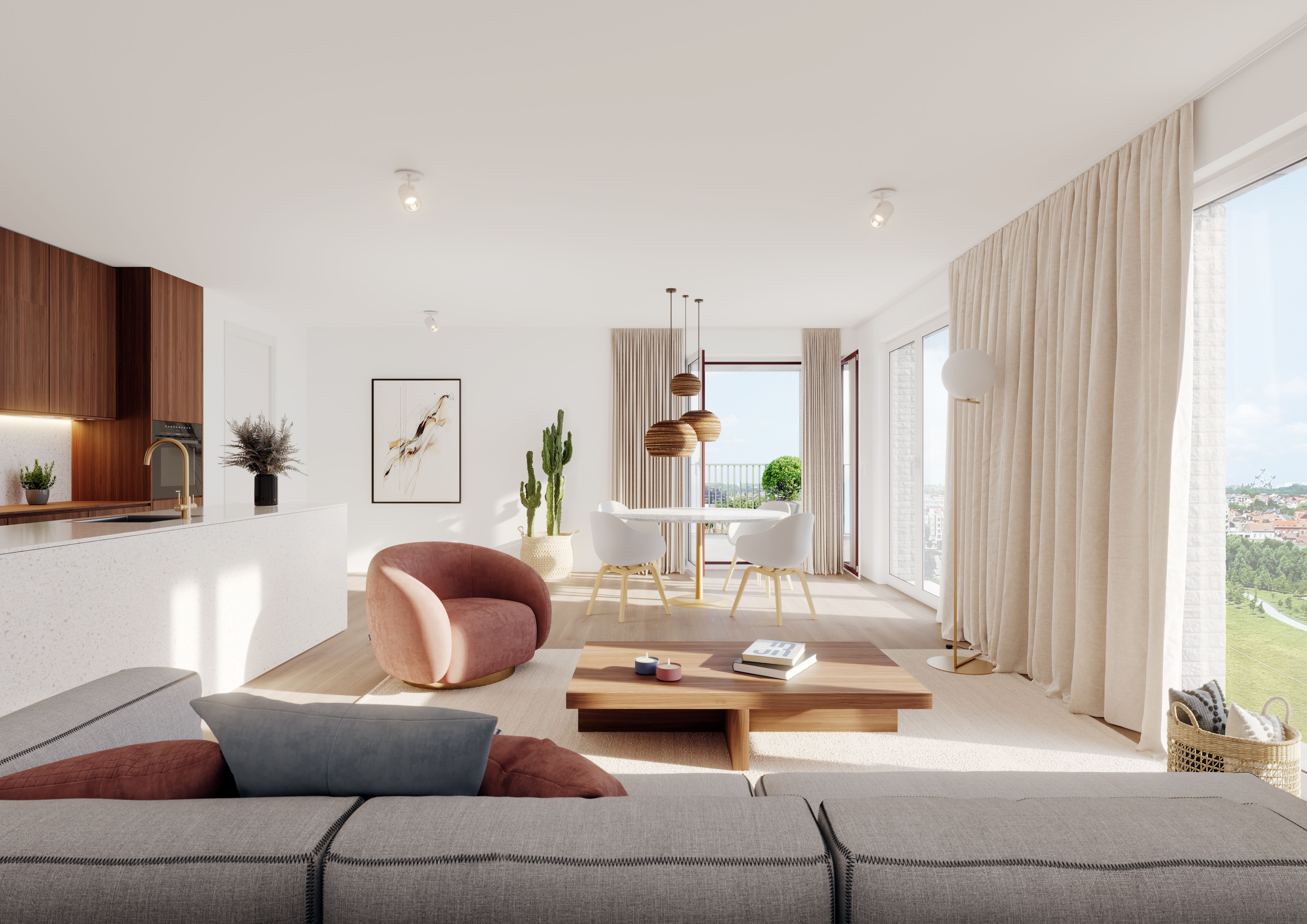 pièce de vie dans un appartement à Bruxelles. L'espace est lumineux et montre un salon rangé, une cuisine à gauche de l'image et une table blanche en arrière plan