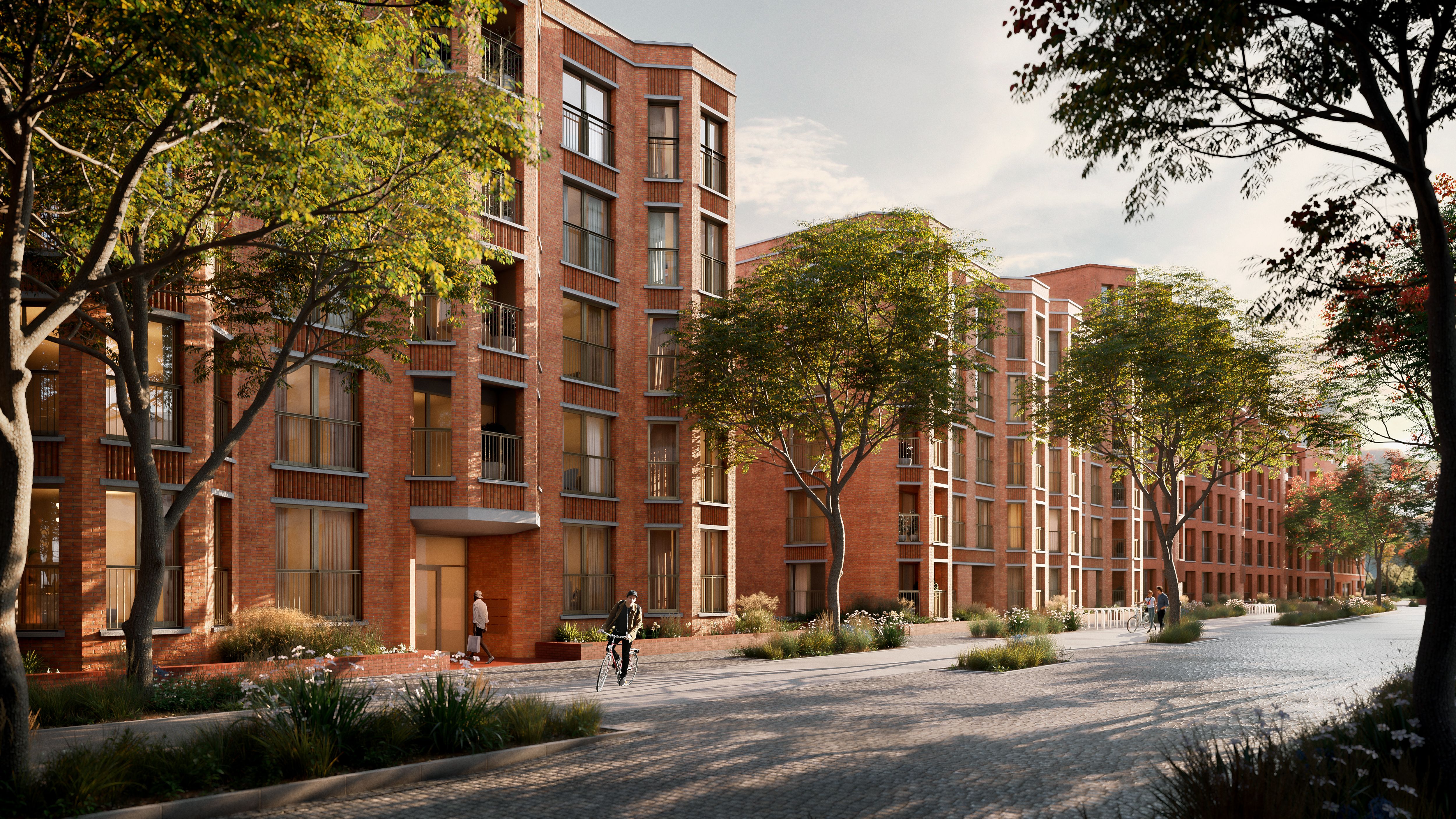 Résidence neuve en briques rouges avec appartements modernes, espaces verts et voirie apaisée dans un quartier résidentiel en Belgique