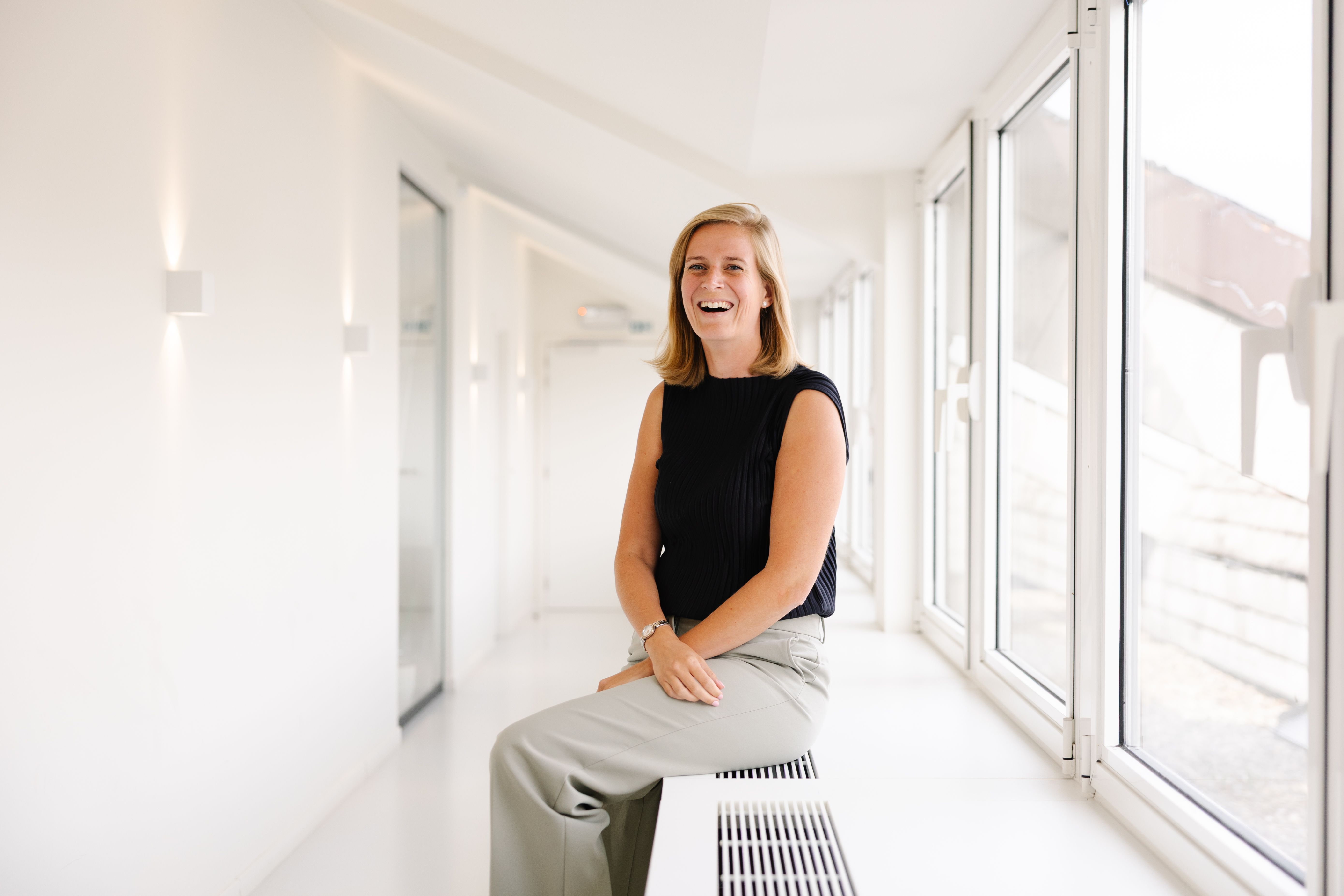 Julie De Rore, kantoorbestuurder van het vastgoedkantoor We Invest Brugge
