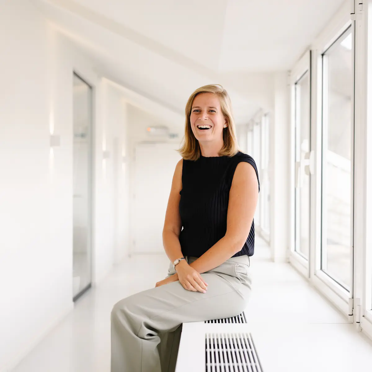 Julie De Rore, kantoorbestuurder van het vastgoedkantoor We Invest Brugge