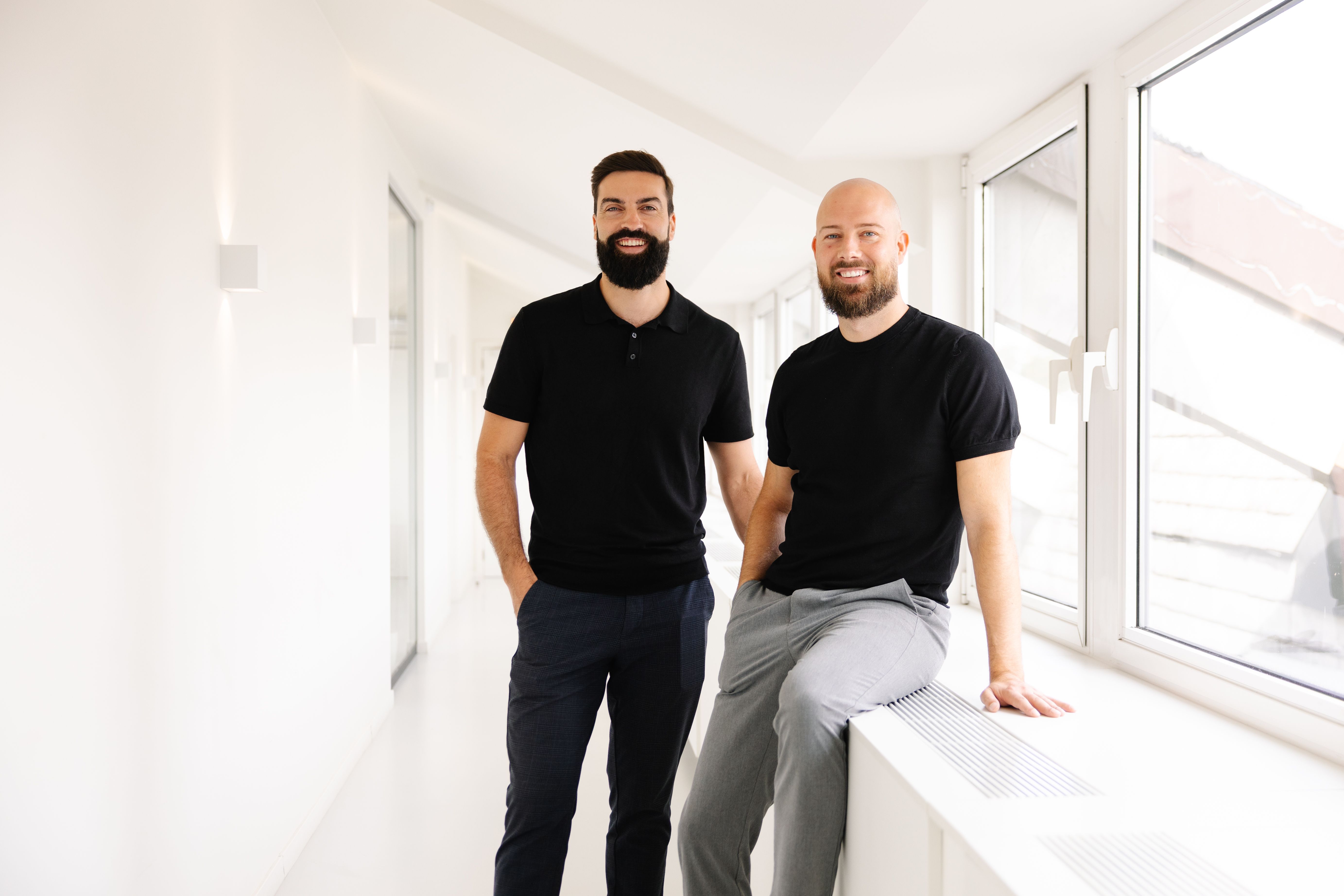 Emiel Passenier en Ward Van Windekens, kantoorbestuurders van het vastgoedkantoor We Invest Leuven