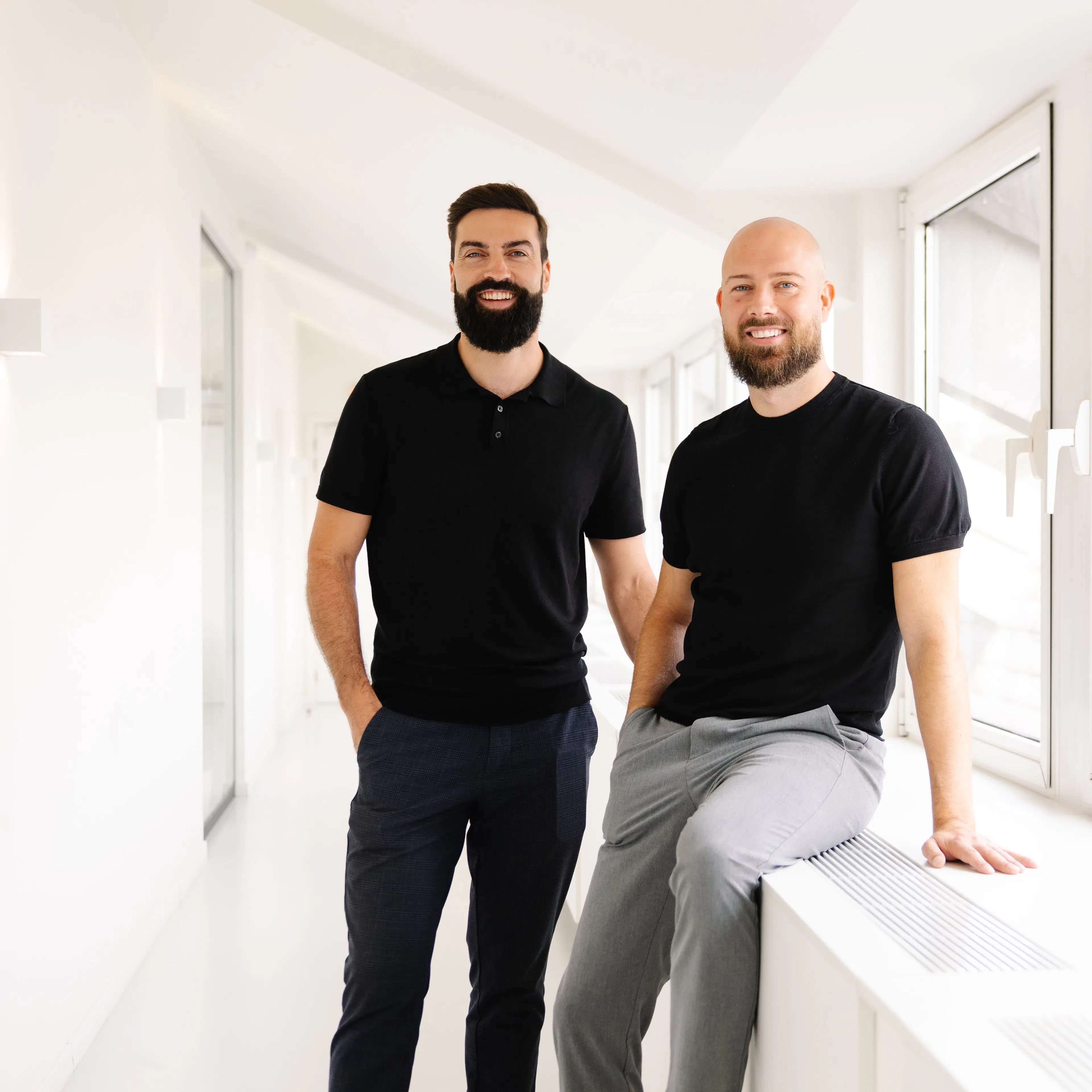 Emiel Passenier en Ward Van Windekens, kantoorbestuurders van het vastgoedkantoor We Invest Leuven